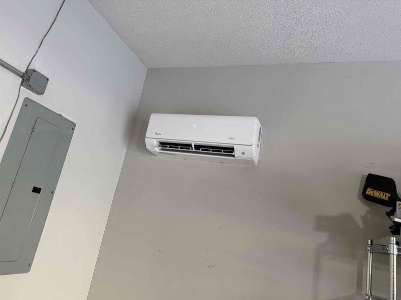 Installed customer-provided ductless mini-split system, mounting the wall-mounted indoor unit and outdoor condenser, running the line set, and completing electrical connections at the panel. Performed nitrogen pressure test and evacuation using a digital manifold and vacuum gauge, then charged the system with R454B refrigerant and verified operation.