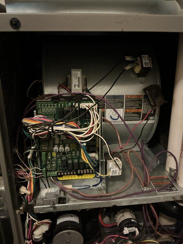 Performed seasonal cooling maintenance on the heat pump system, inspecting the air handler cabinet, control board wiring, and blower assembly. Noted frost accumulation on the suction line and a supply air temperature reading of approximately 52°F, along with worn refrigerant line insulation and minor corrosion on the galvanized surfaces; recommend further evaluation of refrigerant charge and airflow, and replacement of deteriorated line insulation. Filter (20x20x4) was not included in the service.
