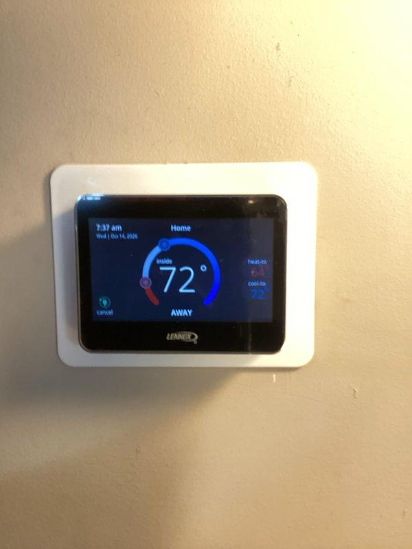 Performed seasonal heating system maintenance, verifying Lennox digital thermostat operation and setpoints. Inspected air handler cabinet and evaporator coil, noting dust and debris accumulation on the coil fins that should be monitored and cleaned as needed. Filter (20x20x4) was not included in this visit and should be checked and replaced at the next scheduled interval.