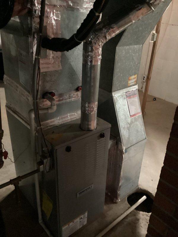 Performed diagnostic and tune-up on a 9-year-old split-system AC paired with a Tempstar gas furnace and air handler that stopped cooling two weeks prior. Inspected the air handler, plenum, ductwork, refrigerant lines, and condensate drain, and verified thermostat operation, which showed a call for cooling (Cool On, setpoint 72°F) with indoor temperature holding at 80°F, confirming the system is not meeting setpoint.