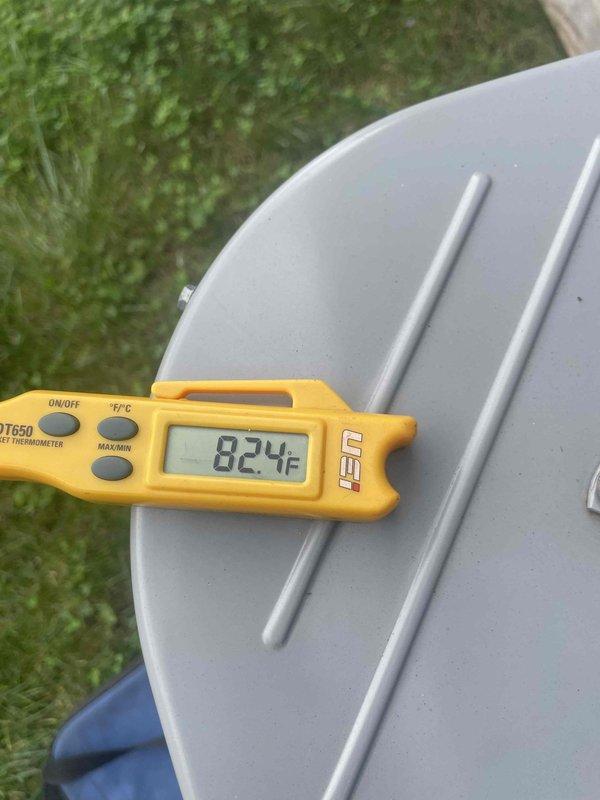Replaced the failed thermostatic expansion valve (TXV) on the system, brazing in the new valve and reconnecting the refrigerant lines. Inspected the surrounding copper piping and found deteriorated, torn suction line insulation and oxidized solder joints, noting the need for proper re-insulation and monitoring. Verified ambient and system temperatures with a digital thermometer to confirm proper operation after the repair.