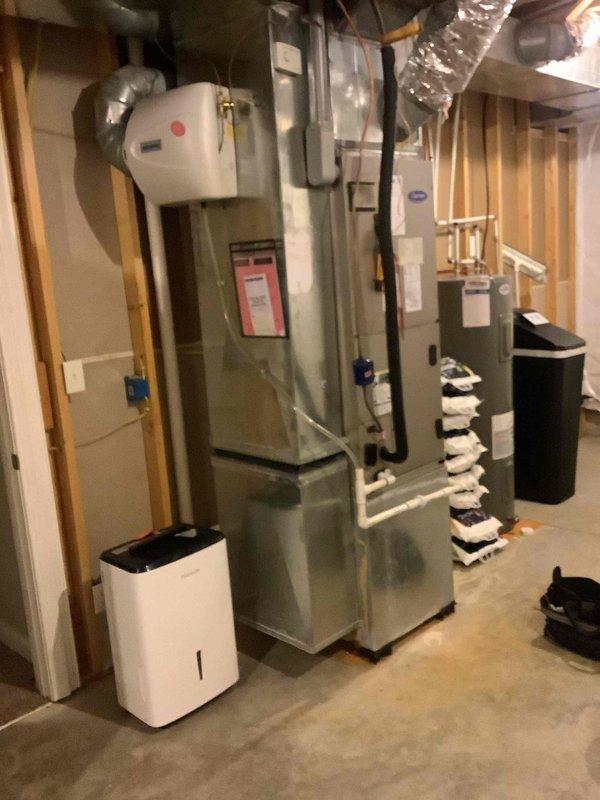 Performed seasonal heating maintenance on the gas furnace and air handler, including replacement of the 20x20x1 return air filter and inspection of the blower assembly, burners, and heat exchanger. Verified proper operation of the whole-house humidifier, condensate drain piping, and refrigerant line insulation, and confirmed the system completed a normal heating cycle with no leaks, corrosion, or visible damage observed.