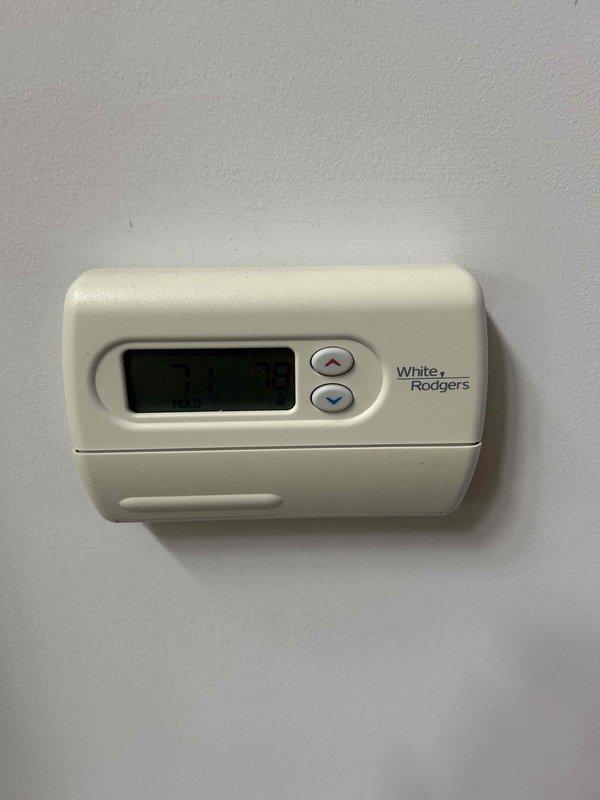 Performed a routine clean and check on the heating system, including inspection of the system components and verification of the White Rodgers digital thermostat, which was intact and operating properly. Inspected the return air filter, noting an installed 16x20x1 filter that differs from the 20x25x4 size specified for this system, and recommended installing the correct size to maintain proper airflow and efficiency.