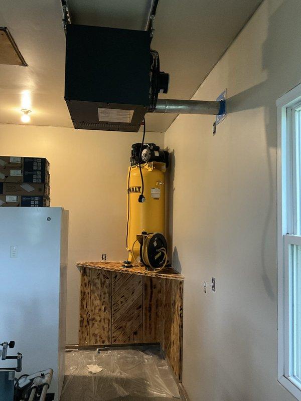 Performed an on-site evaluation for installing new gas supply lines to serve a dryer and a heater in the garage. Inspected the garage interior and the exterior gas service point, including the existing regulator and meter location, to determine the proposed pipe routing, wall penetrations, and clearances around existing equipment. Documented all conditions with photographs for sizing and material planning.