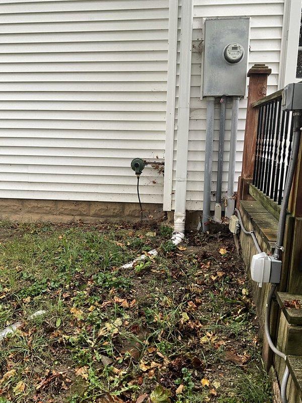 Performed an on-site evaluation for installing new gas supply lines to serve a dryer and a heater in the garage. Inspected the garage interior and the exterior gas service point, including the existing regulator and meter location, to determine the proposed pipe routing, wall penetrations, and clearances around existing equipment. Documented all conditions with photographs for sizing and material planning.