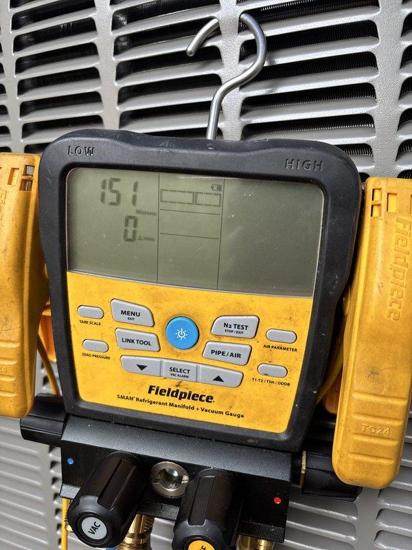 Installed a complete Lennox heat pump system, including the vertical air handler in the utility closet with new refrigerant lines, condensate drain piping, and supply ductwork connections. Evacuated the refrigerant circuit to 151 microns with zero rise per minute, confirming a dry, leak-free system prior to refrigerant release and commissioning.