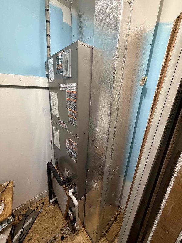 Installed a complete Lennox heat pump system, including the vertical air handler in the utility closet with new refrigerant lines, condensate drain piping, and supply ductwork connections. Evacuated the refrigerant circuit to 151 microns with zero rise per minute, confirming a dry, leak-free system prior to refrigerant release and commissioning.