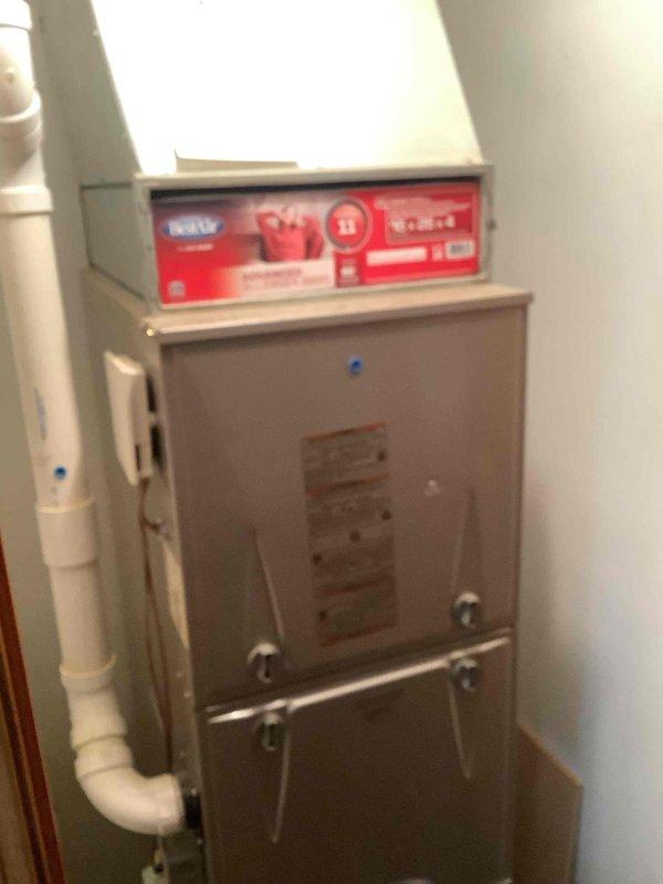 Performed seasonal heating maintenance on the upflow gas furnace, inspecting the cabinet, access panels, PVC condensate/vent piping, and electrical connections for proper condition and operation. Verified thermostat function and system controls as part of the heating tune-up. The system was left in proper working order; the 16x25x4 media filter was not included in this visit.