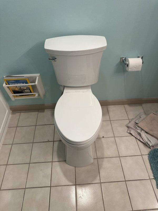 Removed the existing toilet and found a heavily corroded toilet flange with old wax residue and debris around the drain opening. Cleaned the flange area and installed the customer-supplied toilets with new wax seals and closet bolts, then reconnected the water supply lines, tested for proper flush operation, and confirmed no leaks.