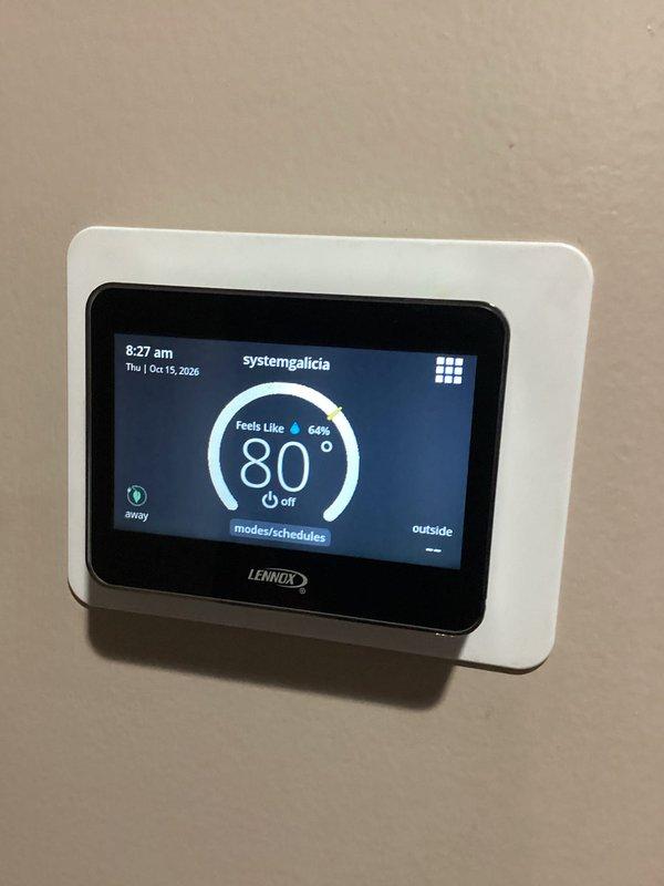Responded to a no-operation call on the outdoor condensing unit. Inspected the condenser cabinet, fan assembly, and coil guard, which were intact with no ice, rust, or physical damage, and checked the Lennox thermostat, which showed the system in the off position with indoor temperature at 80°. Verified the call for cooling and system operation at the thermostat and outdoor unit.