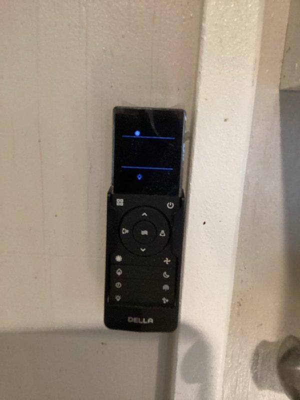 Performed a vacuum evacuation of the refrigerant lines on a Della ductless mini split system to remove air and moisture prior to system operation. Inspected the outdoor condenser, line set insulation, and electrical disconnect connections, finding the equipment secure, clean, and free of visible damage, frost, or corrosion.