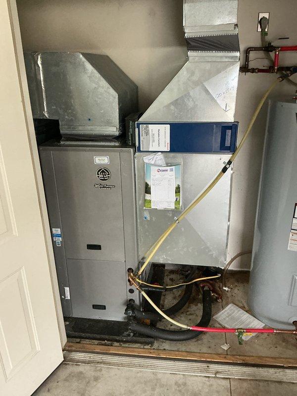 Performed monthly preventative maintenance on the water-source heat pump in heating mode, including inspection of the unit, ductwork, plenum, and thermostat controls. Inspected the GEOLINK circulator pump, loop piping, flexible hoses, and isolation valves, and noted heavy rust on the pump flange along with floor staining and moisture near the pipe connections that should be monitored for leaks. Filter replacement was not included in this visit (20x25x4 filter size).