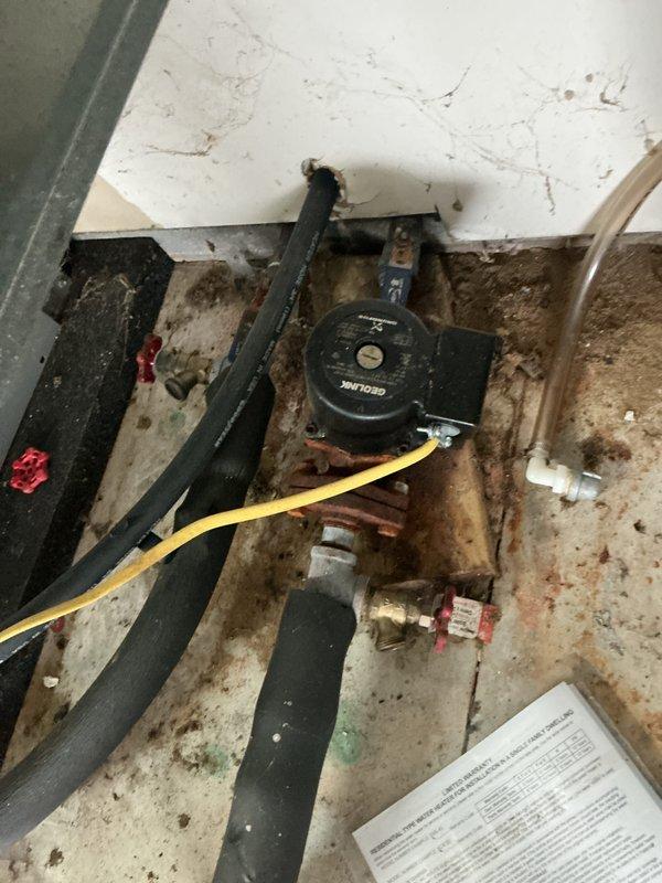 Performed monthly preventative maintenance on the water-source heat pump in heating mode, including inspection of the unit, ductwork, plenum, and thermostat controls. Inspected the GEOLINK circulator pump, loop piping, flexible hoses, and isolation valves, and noted heavy rust on the pump flange along with floor staining and moisture near the pipe connections that should be monitored for leaks. Filter replacement was not included in this visit (20x25x4 filter size).