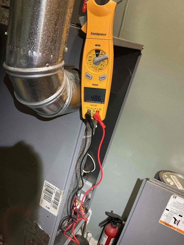 Performed annual heating system maintenance, including electrical measurements with a clamp meter at the equipment cabinet to verify amperage draw of the heating components. Inspected the cabinet, supply ductwork, and associated wiring, finding no visible signs of frost, rust, or physical damage. Filter size could not be determined at the time of service, so filter replacement should be addressed on the next visit.