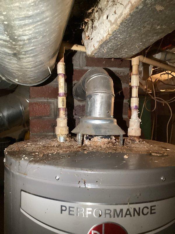 Cleared a clogged bathtub drain by removing the stopper and clearing the blockage from the drain line, restoring proper flow. Verified unobstructed drainage by running water through the tub. Noted heavy rust staining and worn enamel on the tub basin.