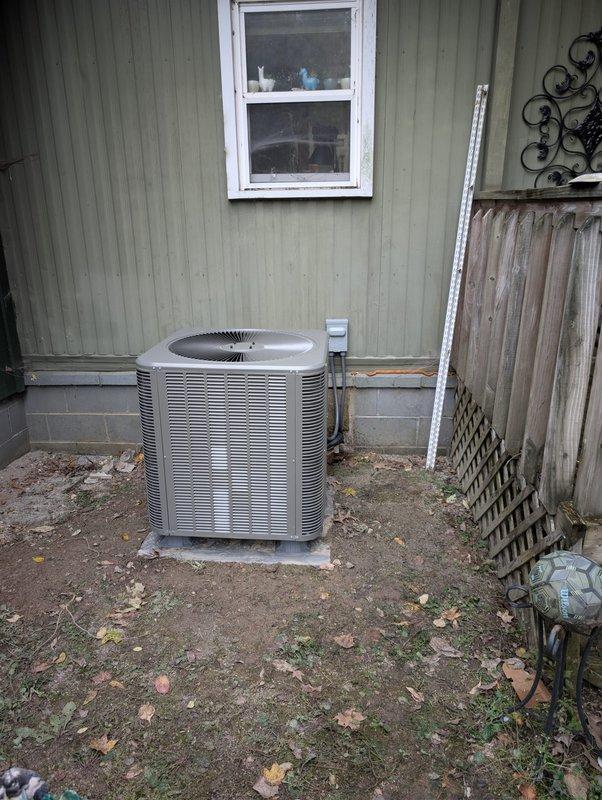 Installed a complete Lennox heat pump system for a mobile home, setting the outdoor condenser unit on a level pad with a properly mounted electrical disconnect and conduit. The refrigerant circuit was evacuated with a digital micron gauge to 160 microns with no rise, confirming a dry, leak-free system before charging and commissioning.