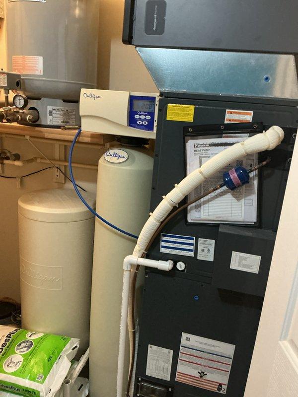 Performed monthly preventive maintenance on the Daikin heat pump air handler, including inspection of the unit cabinet, refrigerant line insulation, filter drier, and PVC condensate drain assembly, with no visible frost, ice, rust, or damage observed. Serviced the 20x20x4 filter per the monthly schedule (filter supplied separately) and updated the on-unit service log to document the visit.