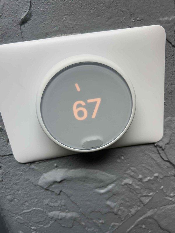 Performed an A/C diagnostic evaluation on the vertically stacked gas furnace and air handler system, inspecting the equipment cabinet, condensate piping, refrigerant line set, and associated flexible ductwork. Reviewed thermostat operation and system settings, and investigated reported moisture staining along the hallway, noting that previously suspected duct leakage may be contributing to moisture and microbial concerns. Findings and recommendations were documented for follow-up.