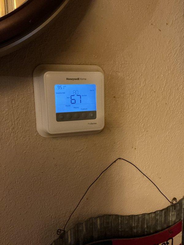 Performed annual heating maintenance inspection on the forced-air system, including a visual inspection of the blower assembly, which showed a dust and debris accumulation on the squirrel-cage blower wheel blades, and verified heating operation through the Honeywell ProSeries thermostat, confirming a heat call with fan in auto mode and proper system response. Filter (16x25x4) was not included with this visit.
