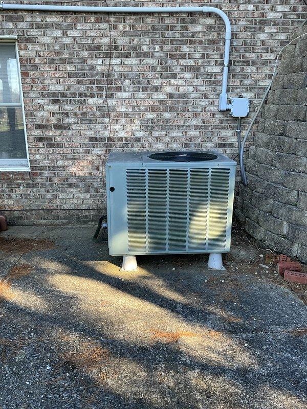 Performed a comfort consultation and inspection of the cooling system, including the outdoor condenser unit and the Rheem gas furnace with R-410A evaporator coil cabinet. The system was found to be low on refrigerant and the unit's age was noted as a factor in recommending replacement. The homeowner was unavailable during the visit, so the replacement estimate was scheduled for a later appointment.