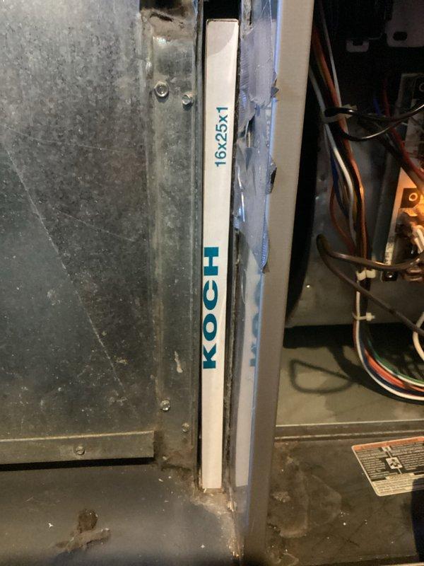 Performed a seasonal tune-up and cleaning on the furnace prior to heating season, inspecting the cabinet interior, removing accumulated dust and debris, and verifying the 16x25x1 filter fit, with torn duct tape noted at the filter slot. Conducted a combustion analysis, recording O2 at 8.9%, CO at 35 ppm, CO2 at 7.9%, and flue temperature of 126.2°F, and confirmed the unit was operating safely and ready for use.