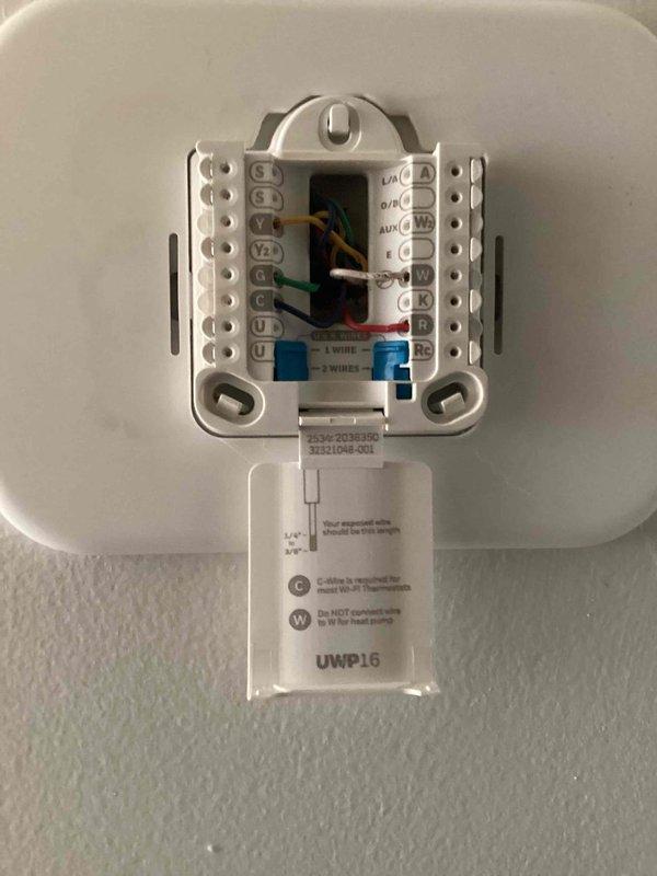 Responded to a new installation complaint of the furnace failing to raise indoor temperature above 66°F against a 72°F setpoint. Inspected the thermostat wall plate and low-voltage wiring connections, with terminals and conductors showing no visible damage, and measured a temperature reading at the ductwork to evaluate heating output and airflow performance.