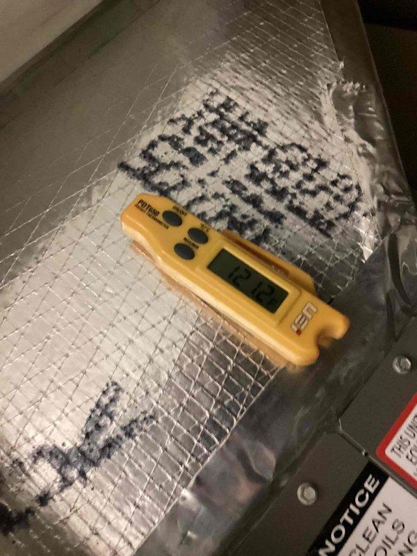 Responded to a new installation complaint of the furnace failing to raise indoor temperature above 66°F against a 72°F setpoint. Inspected the thermostat wall plate and low-voltage wiring connections, with terminals and conductors showing no visible damage, and measured a temperature reading at the ductwork to evaluate heating output and airflow performance.