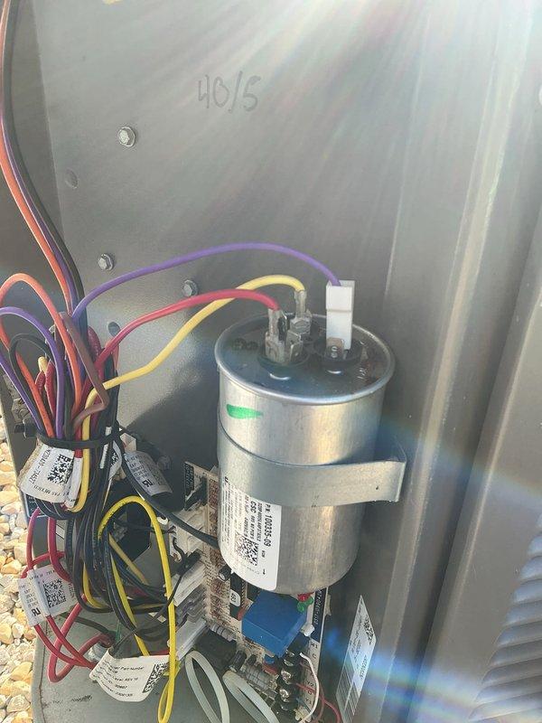 Performed seasonal maintenance on both the heating and cooling systems, including inspection of the outdoor condenser and indoor equipment. Inspected the dual-run capacitor, verified secure mounting and wiring connections, and confirmed proper condition of the control board and wire harness with no visible corrosion, frost, or physical damage. Noted a 20x20x4 filter size for the system; filter not included in the service.