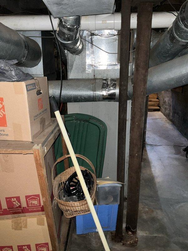 Performed an on-site evaluation of a non-operational upright furnace and associated galvanized ductwork in a basement mechanical space to scope a full system replacement. Inspected the furnace cabinet, access panel, and supply/return duct runs, including flexible duct and taped duct joints, and documented existing conditions with photos. Prepared a replacement estimate for the failed unit, with scheduling coordinated to accommodate the customer's availability.