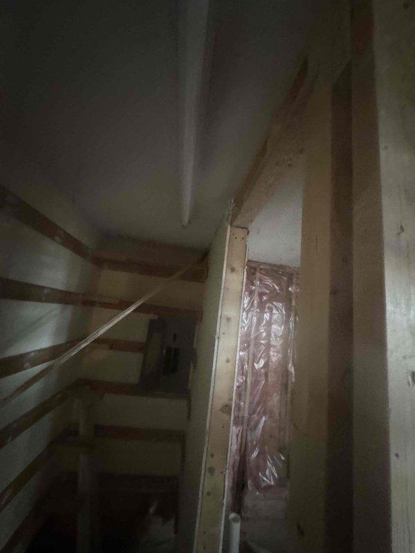 Evaluated the electrical scope for a structure under renovation, including rewiring an existing light fixture to an independent switch, installing a bathroom exhaust fan, and repairing a sump pump receptacle. Assessed the framed wall cavities and existing wiring for routing options and reviewed the feasibility of running a dedicated 240V circuit from the main breaker panel for an EV charging station.