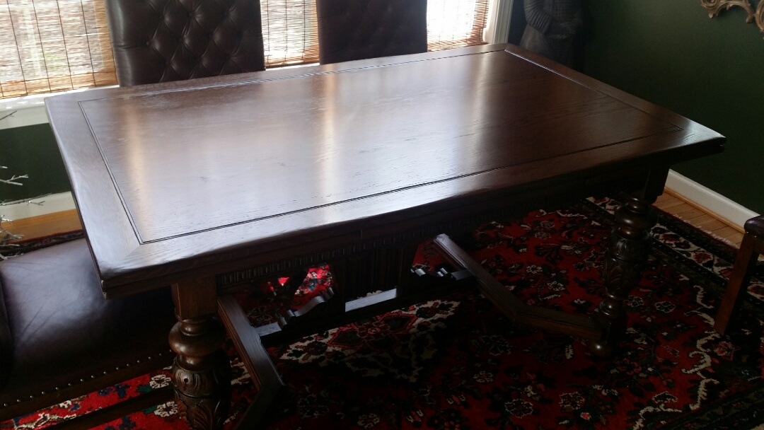 Refinished dining table. table was worn. table refinishing is complete. chairs also need reupholster. complete custom vintage upholstery for chairs.