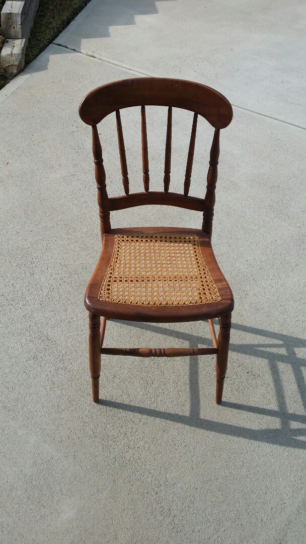 Reglue  of dining chair seat in need of repair client does not want custom upholstry cushions. recane antique chair.