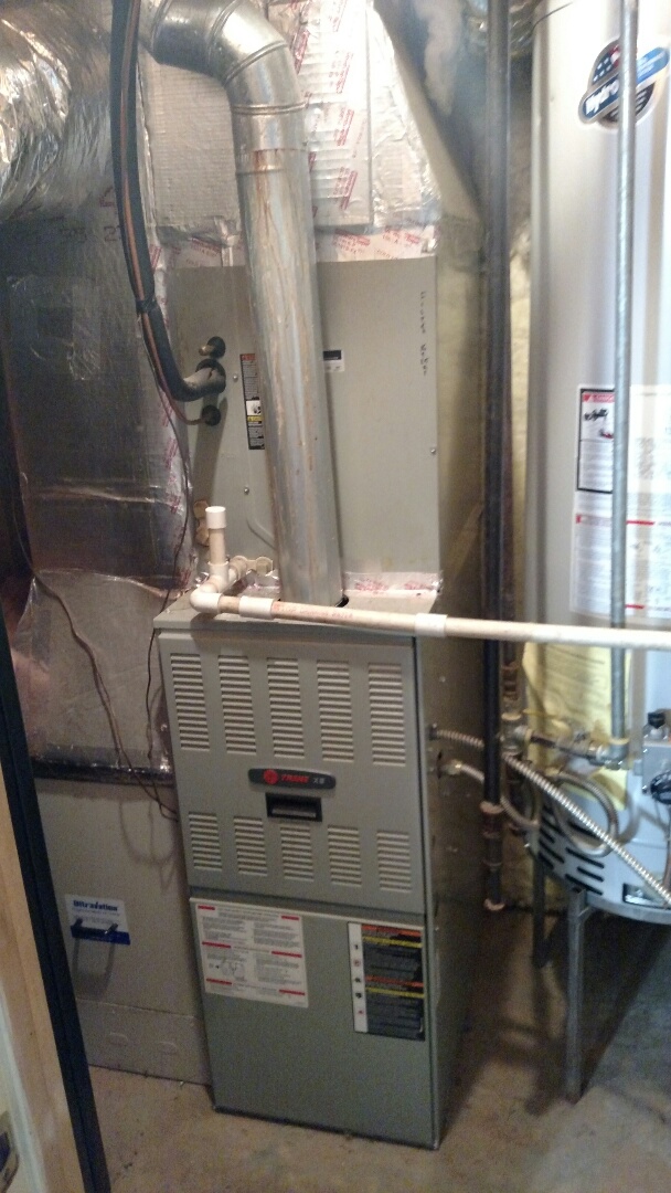 Oakwood, GA - Performing heating maintenance on this 10 year old Trane 80% natural gas furnace. Checking 20x25x5 Ultravation pleated media filter. Checking temperature output and testing safety circuits. Cleaning flame sensor and checking burner operations. We are a locally owned and operated family heating and air conditioning company. We are here to serve you and are in or near this area on almost a daily basis. Oakwood, GA - Performing heating maintenance on this 10 year old Trane 80% natural gas furnace. Checking 20x25x5 Ultravation pleated media filter. Checking temperature output and testing safety circuits. Cleaning flame sensor and checking burner operations. We are a locally owned and operated family heating and air conditioning company. We are here to serve you and are in or near this area on almost a daily basis.