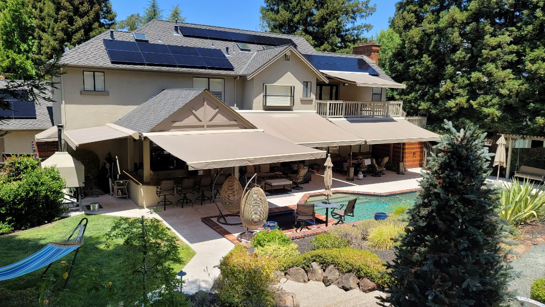 Lafayette, CA - Here is a home in Lafayette that has 6 Sunesta Retractable awnings, 5 of which are shown in this picture, along with a small door, fixed awning on the left side. After getting the first one , the one on the far right, the customer kept adding on so they and their extended family can better enjoy their beautiful yard, barbecue area and pool. Lafayette, CA - Here is a home in Lafayette that has 6 Sunesta Retractable awnings, 5 of which are shown in this picture, along with a small door, fixed awning on the left side. After getting the first one , the one on the far right, the customer kept adding on so they and their extended family can better enjoy their beautiful yard, barbecue area and pool.