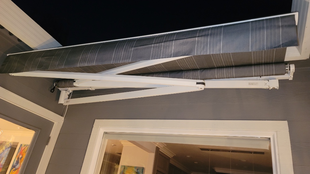 Walnut Creek, CA - Customer chose a Sunesta, Sunstyle, smartfold retractable awning. A smartfold awning is where one arm folds under the other one. This allows the projection of the awning to be longer than the width. This awning was only 8'4" wide, but could extend out 11' 6". They were thrilled to be able to extend out to the end of their deck, with only this narrow width. They also have a beautiful view, but since was dark when the install was finished, see their awning with a view on facebook for Awning Pros Walnut Creek, CA - Customer chose a Sunesta, Sunstyle, smartfold retractable awning. A smartfold awning is where one arm folds under the other one. This allows the projection of the awning to be longer than the width. This awning was only 8'4" wide, but could extend out 11' 6". They were thrilled to be able to extend out to the end of their deck, with only this narrow width. They also have a beautiful view, but since was dark when the install was finished, see their awning with a view on facebook for Awning Pros