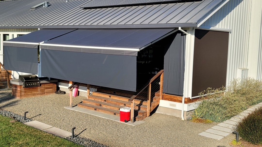Napa, CA - West facing back deck out in beautiful Napa CA. With the low son its important to have a Retractable awning from Sunesta where they offer a 5' screen that drops out of the front bar of the awning. This awning is the Sunstyle model where one can even motorized this screen. This Waycross the comfort of your chair, you can touch a button on the remote to lower or raise this screen. Napa, CA - West facing back deck out in beautiful Napa CA. With the low son its important to have a Retractable awning from Sunesta where they offer a 5' screen that drops out of the front bar of the awning. This awning is the Sunstyle model where one can even motorized this screen. This Waycross the comfort of your chair, you can touch a button on the remote to lower or raise this screen.