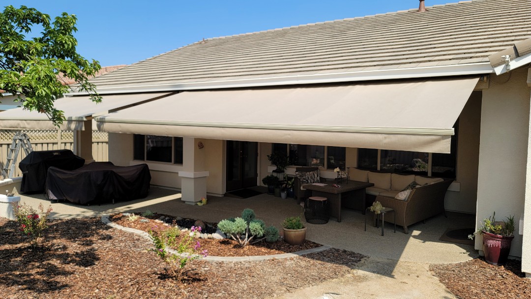 Lincoln, CA - Fabric recovers chosen from Sattler, installed on Sunesta Retractable Awnings that were originally installed 19 years ago. Awnings were still in great shape. The Somfy motors were still working great. They just needed new fabric which Awning Pros Inc was happy to help with. Lincoln, CA - Fabric recovers chosen from Sattler, installed on Sunesta Retractable Awnings that were originally installed 19 years ago. Awnings were still in great shape. The Somfy motors were still working great. They just needed new fabric which Awning Pros Inc was happy to help with.
