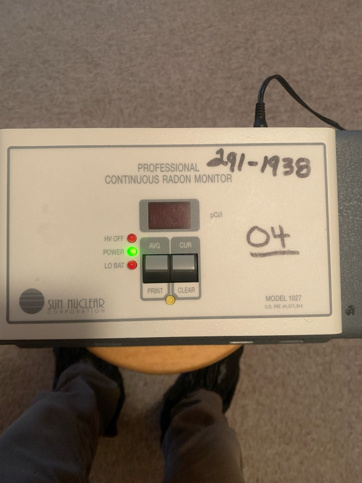 Grand Rapids, MI - Setting a continuous radon monitor in this condo. We’ve installed radon mitigation systems in other condos in this same community. Grand Rapids, MI - Setting a continuous radon monitor in this condo. We’ve installed radon mitigation systems in other condos in this same community.
