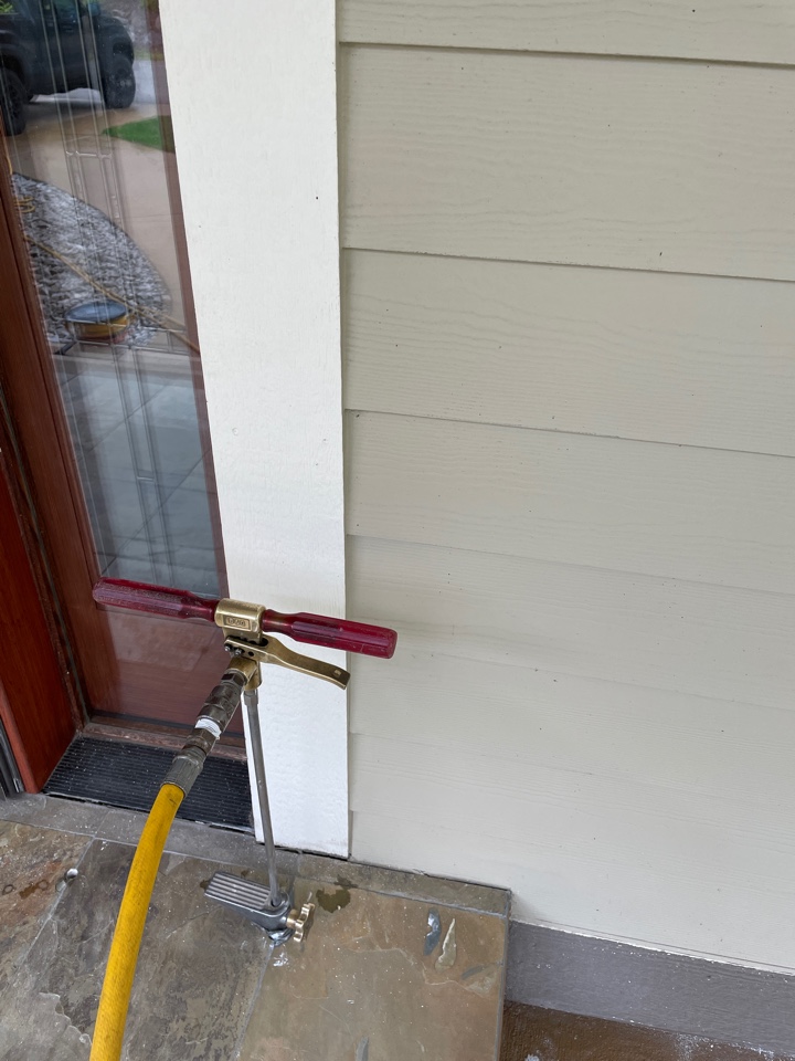 Rockford, MI - Termite treatment slab injection at front porch where termites swarmed. Rockford, MI - Termite treatment slab injection at front porch where termites swarmed.