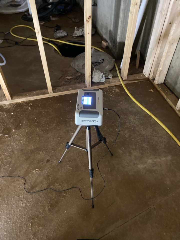 Setting a radon test in a new house being built 