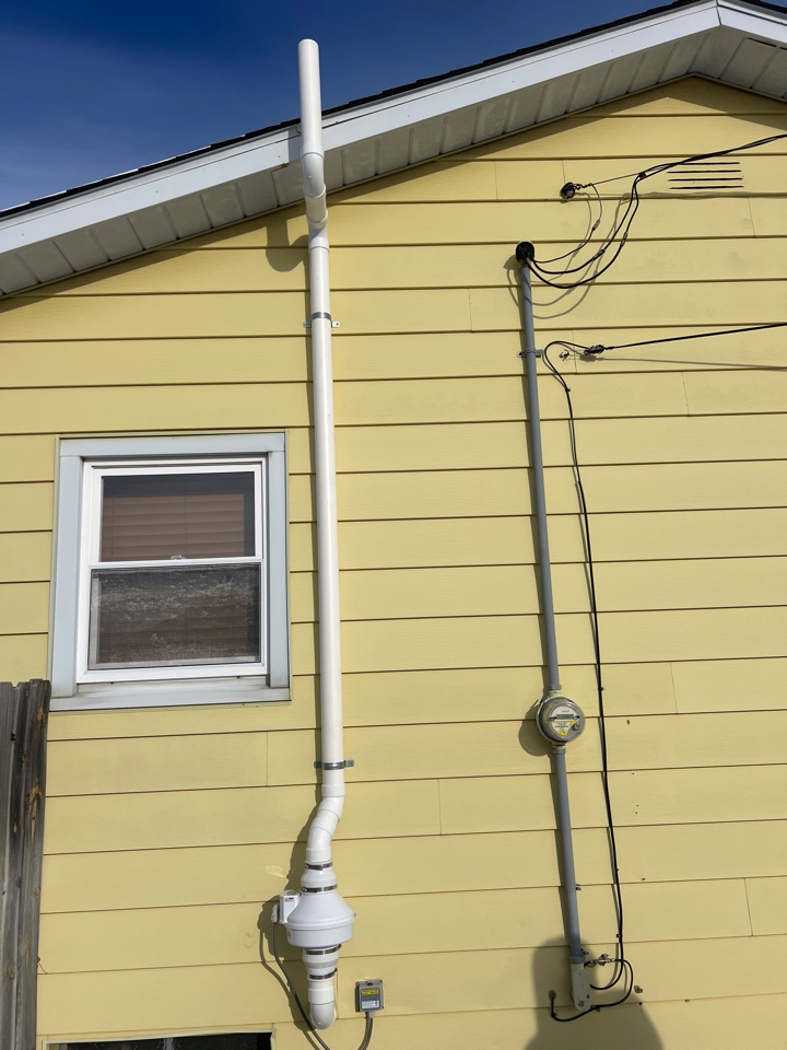 Radon mitigation system installation 