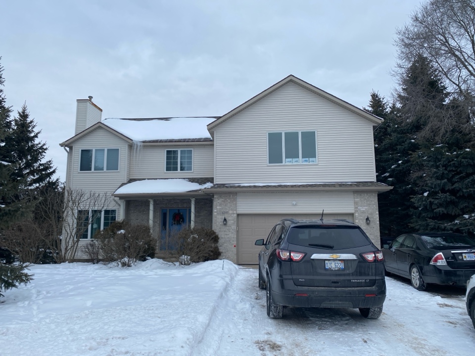 A radon mitigation system is being installed at this house 