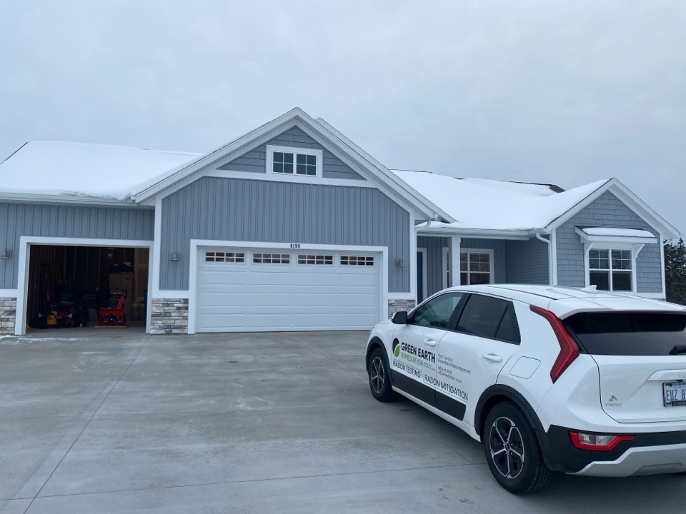 This newly constructed house has elevated radon levels. Later this month a radon mitigation system will be installed to lower the radon levels to an acceptable level 