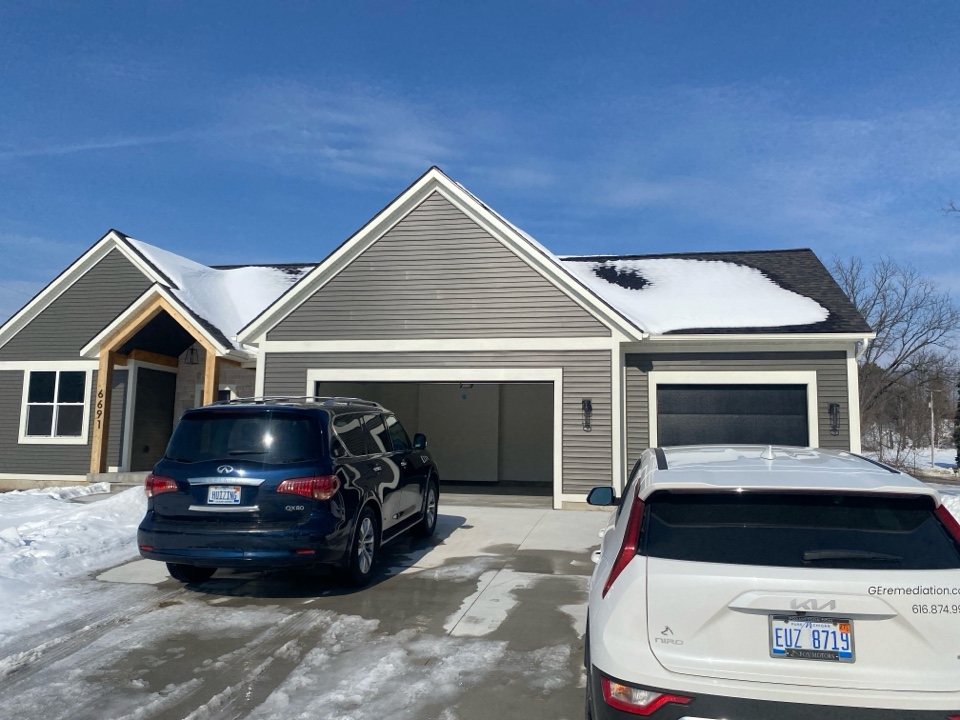 This new construction house has elevated radon levels. Later this month a radon mitigation system will be installed to lower the radon levels 