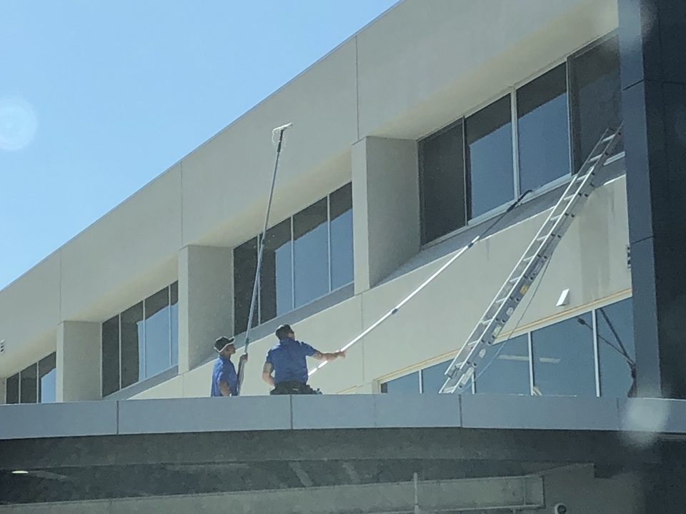 Washing windows at Mercedes Benz in Scottsdale 