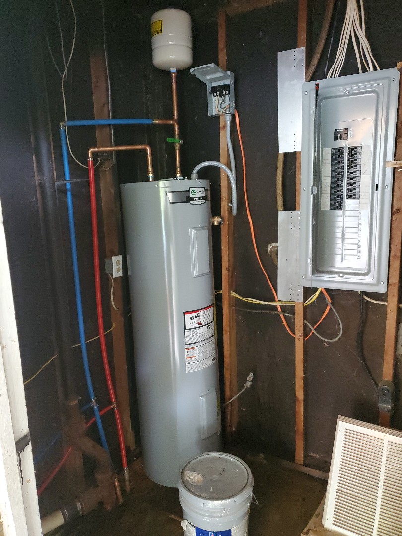 Water heater replace and new laundry box and piping