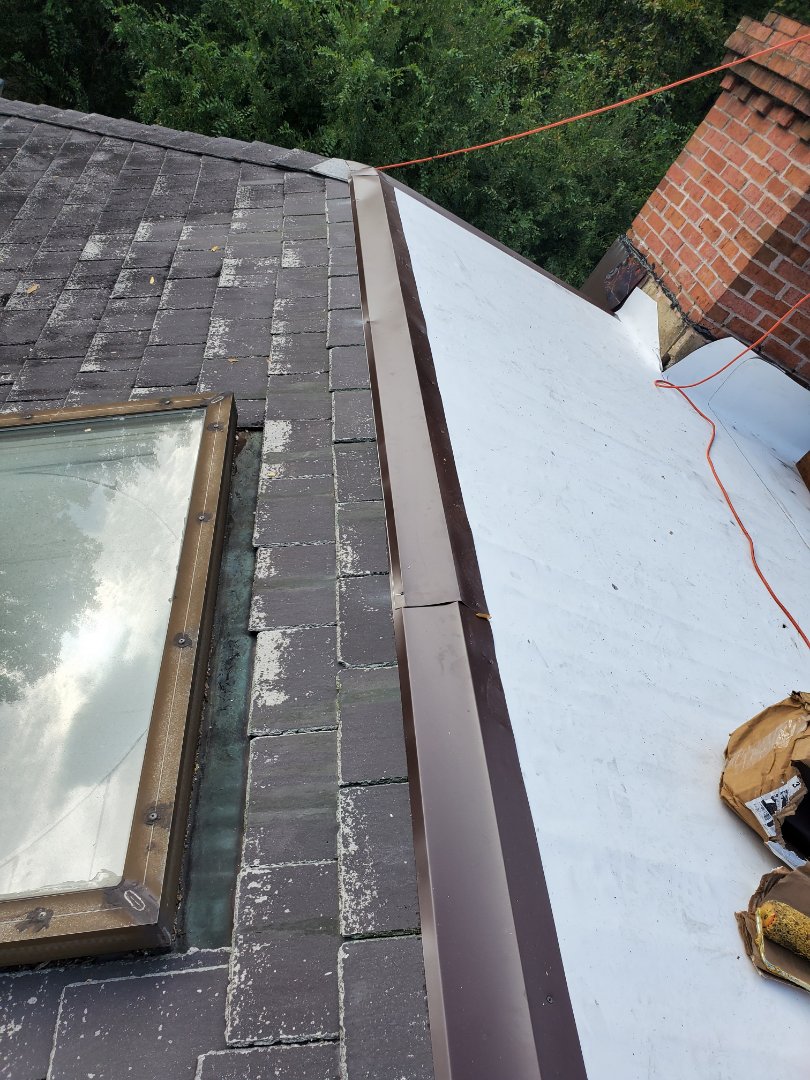 McLean, VA - AST Roofing and Comsulting LLC was called in to check on a roof leak that has slate, copper, and flat roofing. AST Roofing tried to solder the copper seams that had opened up but found water had built up below the copper. AsT proposed replacing the copper top flat section with TPO. The job was completed in one and half day. McLean, VA - AST Roofing and Comsulting LLC was called in to check on a roof leak that has slate, copper, and flat roofing. AST Roofing tried to solder the copper seams that had opened up but found water had built up below the copper. AsT proposed replacing the copper top flat section with TPO. The job was completed in one and half day.
