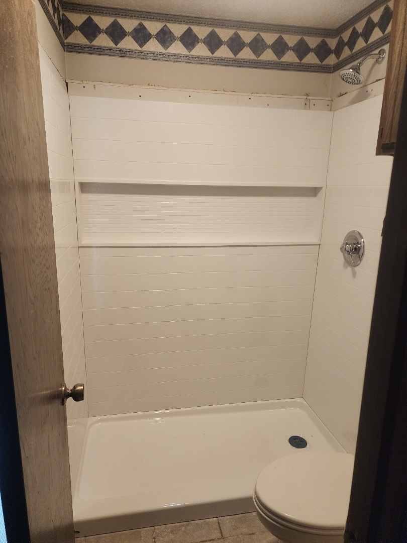 Replaced cast iron tub with 5' shower.
