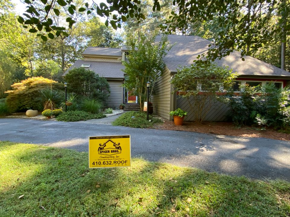 We just finished replacing this house with brand new Timberline HDZ shingles Barkwood in color and installed a brand new ridge vent using GAF snow country.