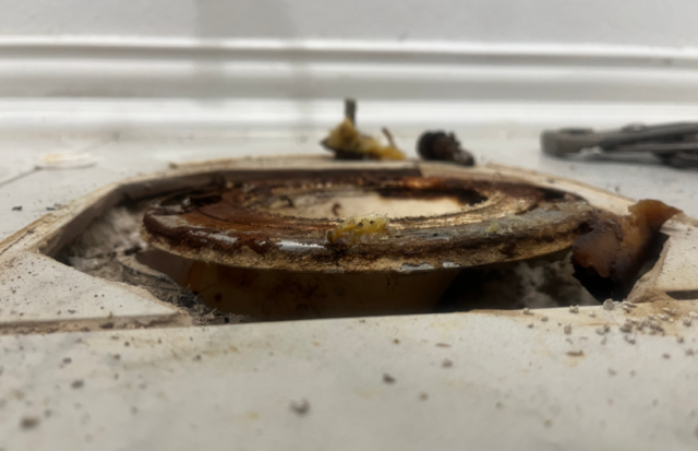 Pull and reset toilet and fix leaking drain under sink